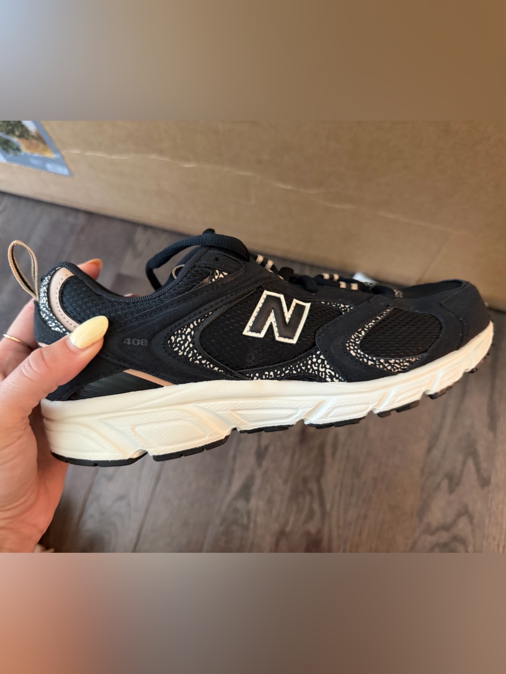 New Balance 408 Black and White Athletic Sneakers